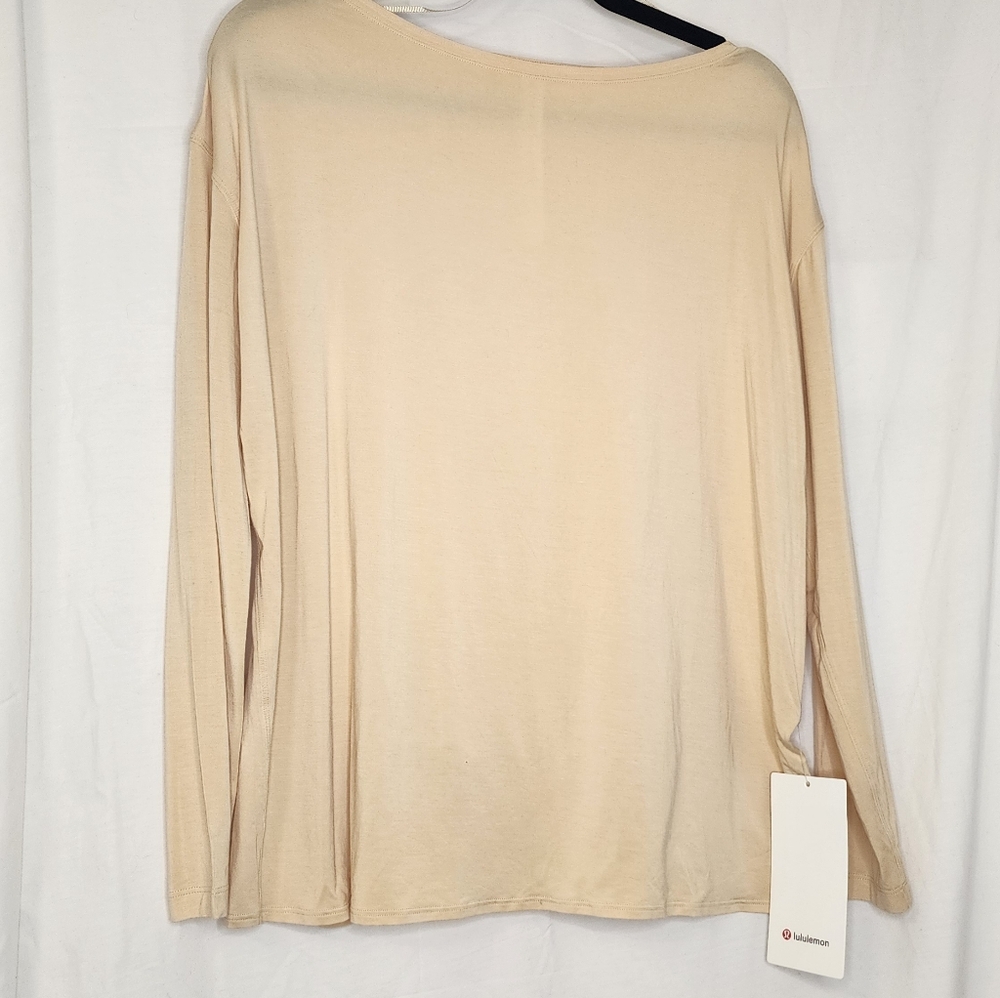 NWT Sz.10 Lululemon Elegant Cream Long Sleeve Top With Back Cut Out